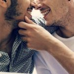 two men about to kiss